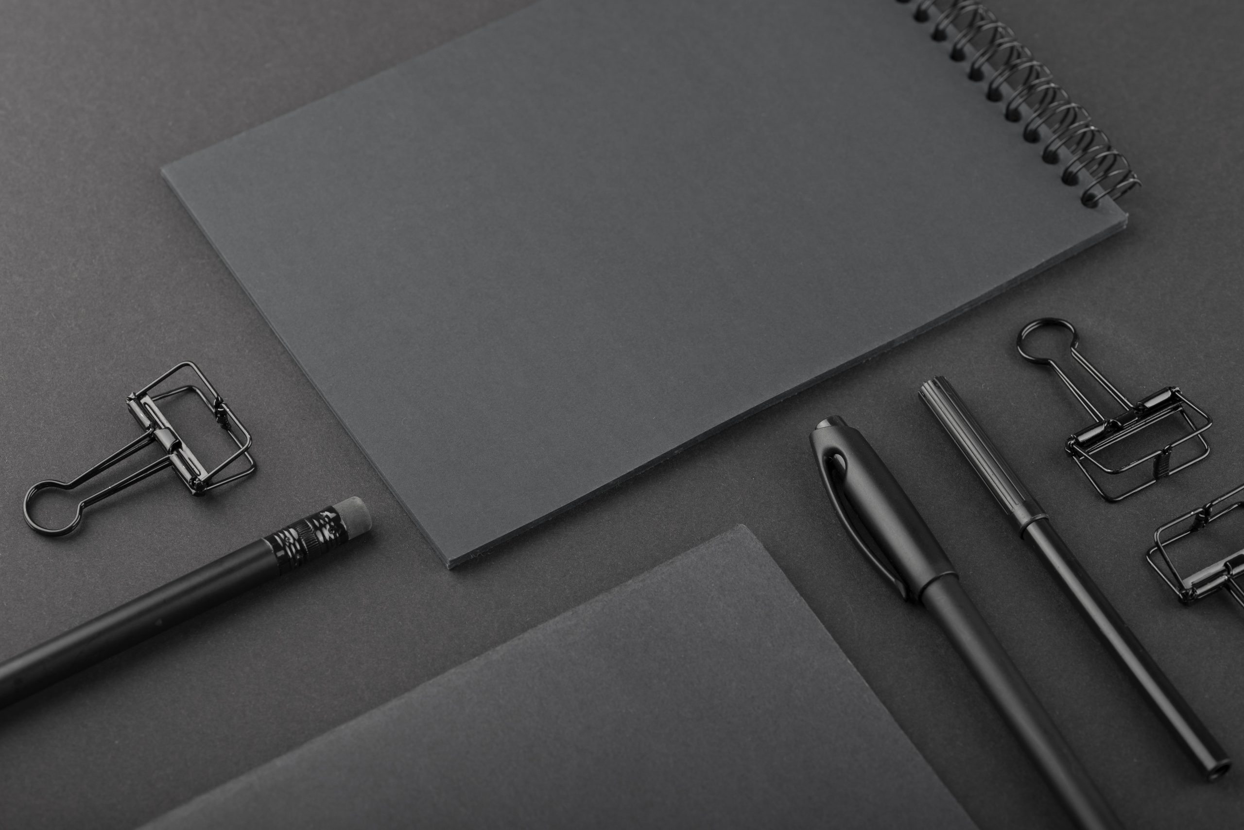 black-background-with-stationery-min